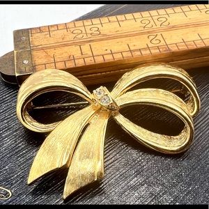 Vintage AVON gold bow brooch rhinestones ribbon pin